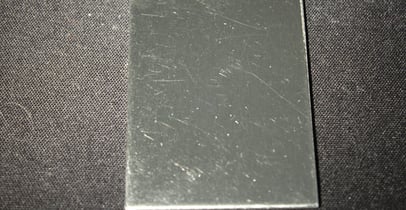 Cleaning curcumin from stainless steel
